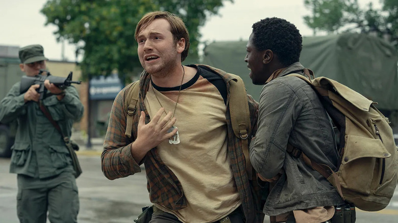 Pete trying to pull Ray back into the walk in The Long Walk