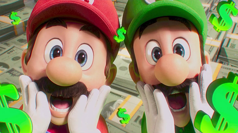 Mario and Luigi surrounded by dollar signs in The Super Mario Bros. Movie