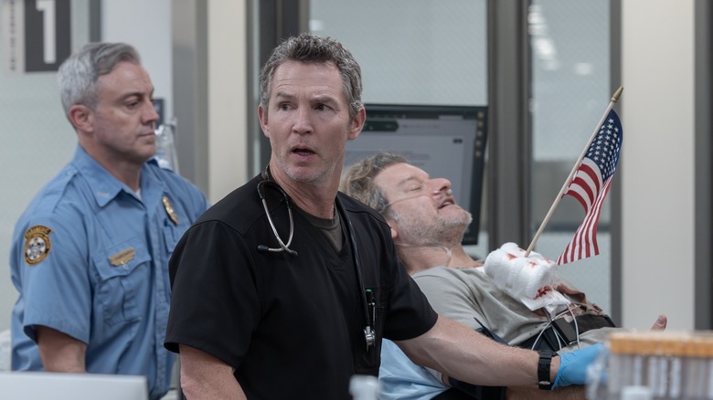 Abbott looking up alarmed on The Pitt