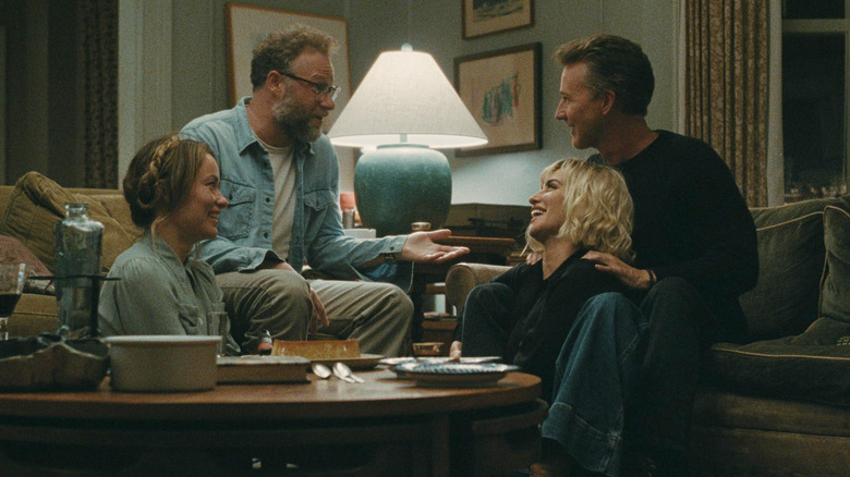 Olivia Wilde as Angela, Seth Rogen as Joe, Penélope Cruz as Pina, and Edward Norton as Hawk share a laugh in The Invite