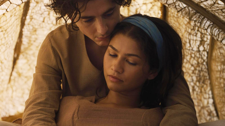 Pani and Chani snuggling together in a tent in Dune: Part Three