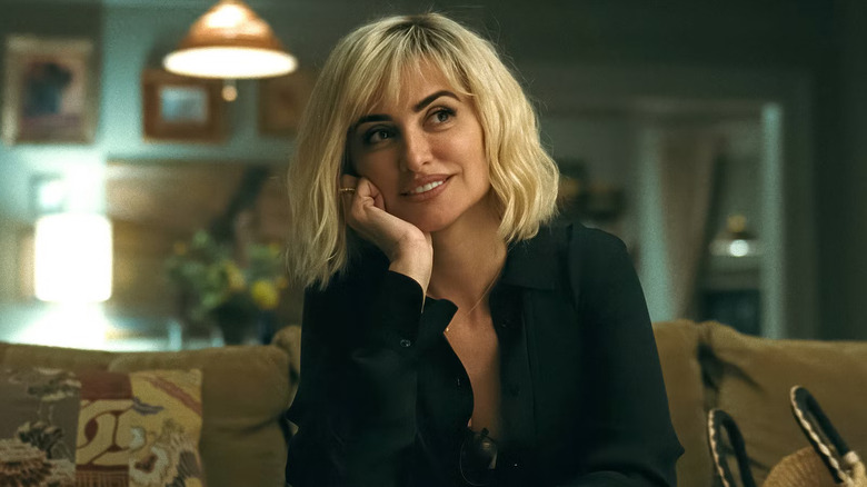 Pina listening to someone smiling in The Invite