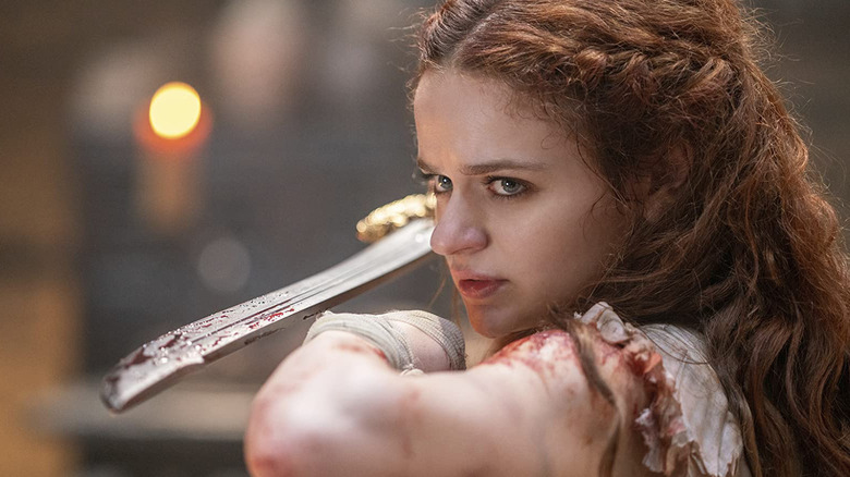 Joey King wielding a sword in The Princess