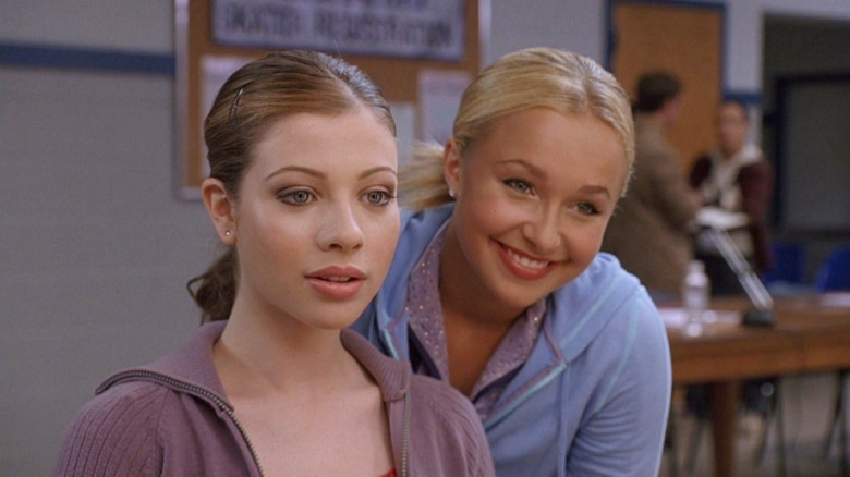 Gennifer smiling over Casey's shoulder in Ice Princess