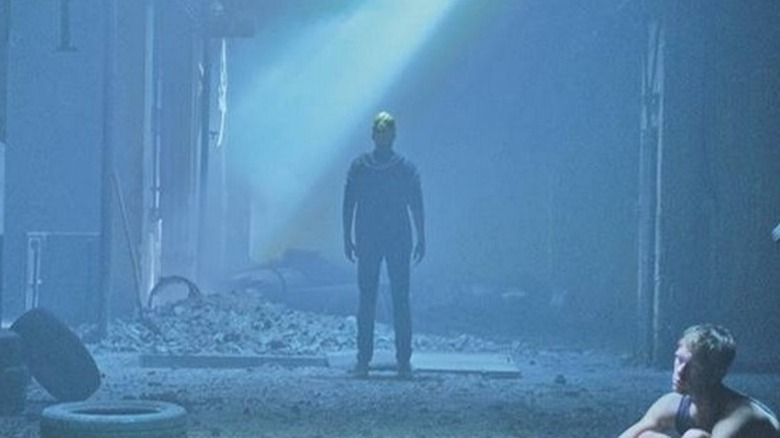 Silhouetted figure standing