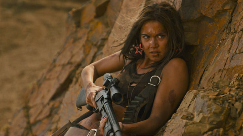 Matilda Anna Ingrid Lutz with rifle