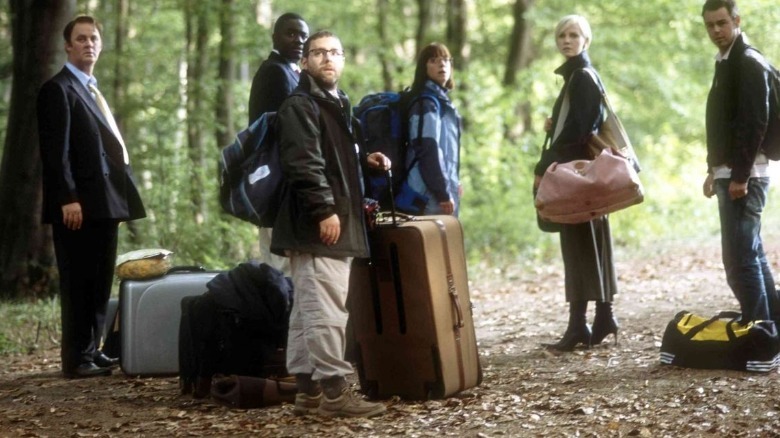 The cast of "Severance" in woods