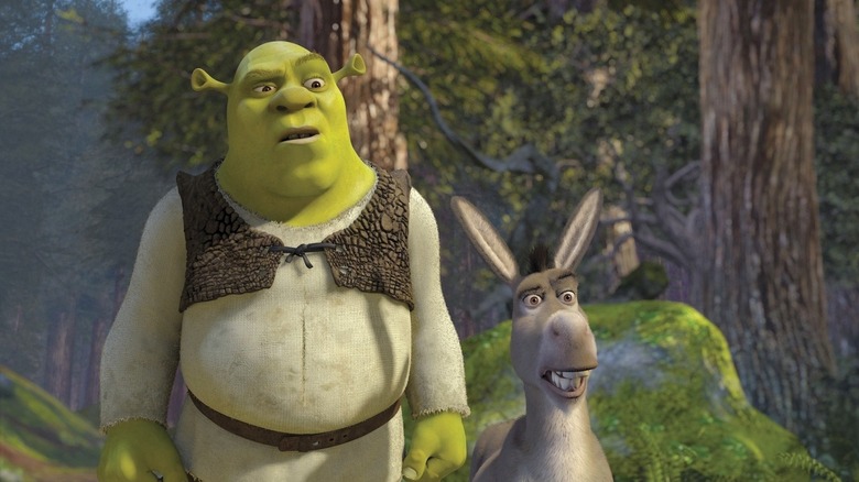 Shrek (Mike Myers) and Donkey (Eddie Murphy) stare bewildered in Shrek