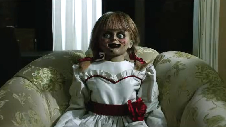 Annabelle sitting in a chair in Annabelle Comes Home