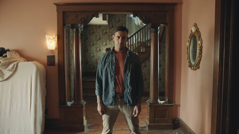 CM Punk's Don Koch staring ahead in Girl on the Third Floor