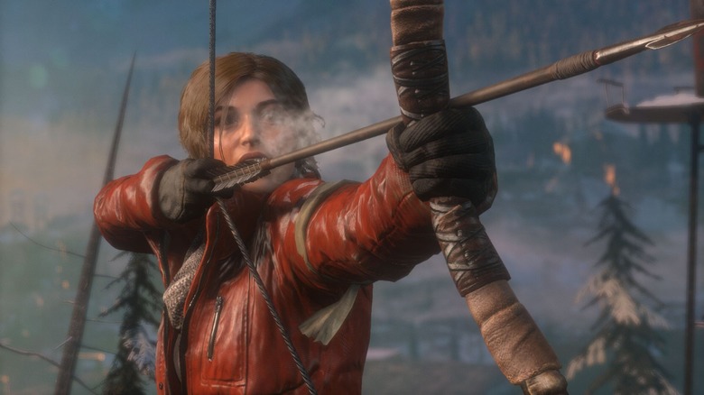 Lara Croft wielding a bow and arrow in Rise of the Tomb Raider