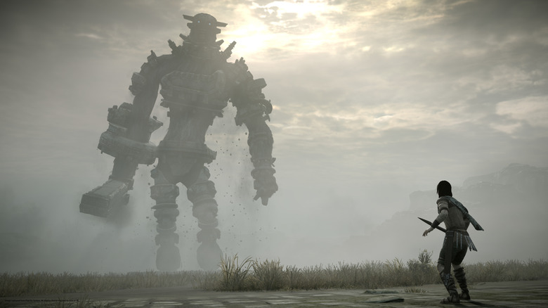 Wander staring at the third Colossus in Shadow of the Colossus