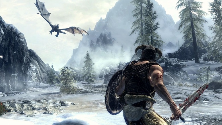 The dragonborn facing a flying dragon in The Elder Scrolls V: Skyrim