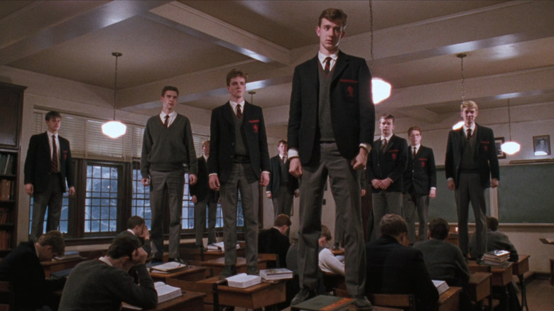 Students standing on desks in Dead Poets Society