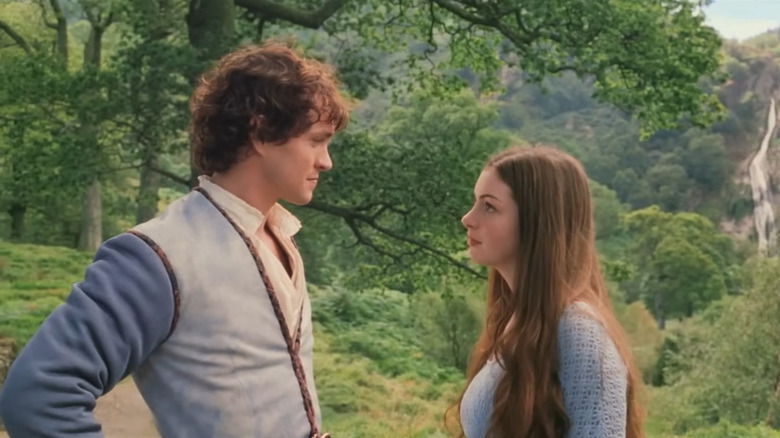 Ella (Anne Hathaway) and Char (Hugh Dancy) stare at each other in Ella Enchanted