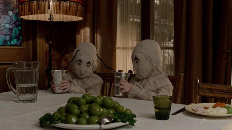 The Twins eating dinner in Miss Peregrine's Home for Peculiar Children