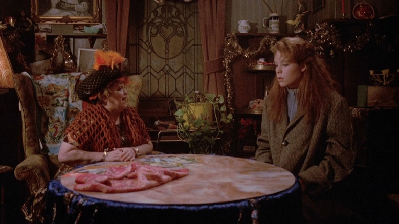 Louise (Robin Lively) learns about her heritage from Serena (Zelda Rubenstein) in Teen Witch