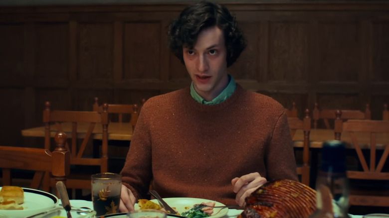 Angus (Dominic Sessa) eating Christmas dinner in The Holdovers