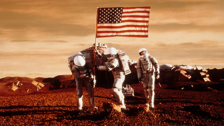 The astronauts planting thee American flag on Mars in Mission to Mars