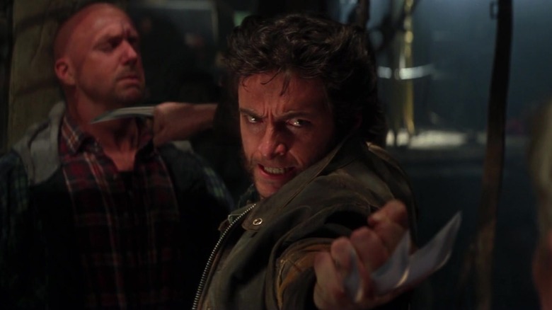 Hugh Jackman as Wolverine with his claws out in X-Men
