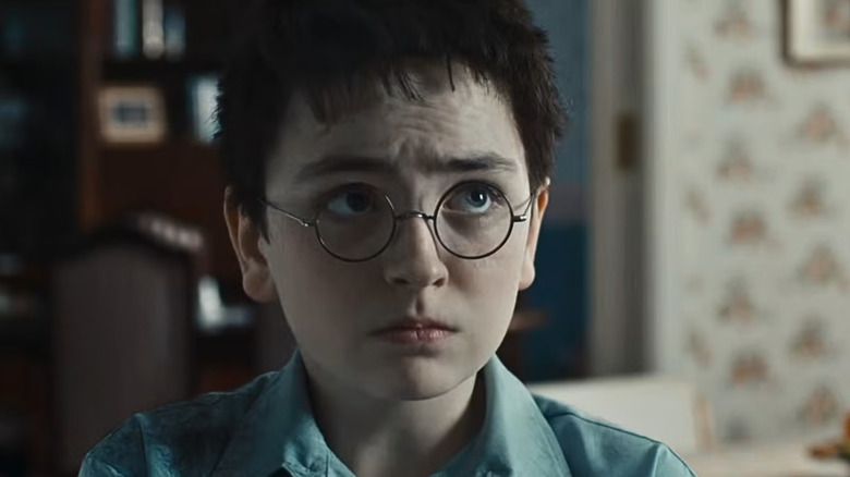 Harry looking up fearfully in Harry Potter and the Philosopher's Stone