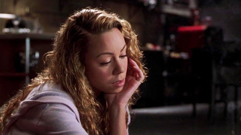 Mariah Carey's Billie Frank sits looking sad in Glitter.jpg