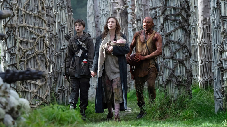 Spike, Isla, and Dr. Kelson walking through the Bone Temple in 28 Years Later