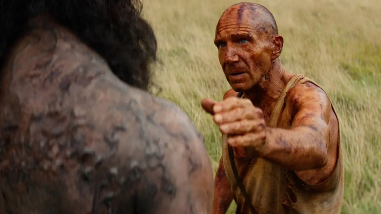 Ralph Fiennes as Dr. Kelson reaches out to Samson in 28 Years Later: The Bone Temple