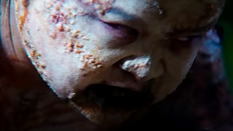 A close-up shot of a mutated rage zombie in 28 Years Later