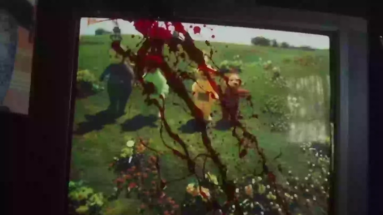 Blood splatters on a TV showing the Teletubbies