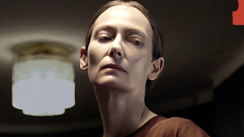 Tilda Swinton as Madame Blanc looking sinister in Suspiria