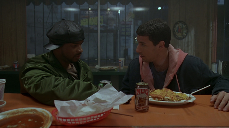 Damon Wayans' Detective Jack Carter sits alongside Adam Sandler's Archie Moses in restaurant in Bulletproof