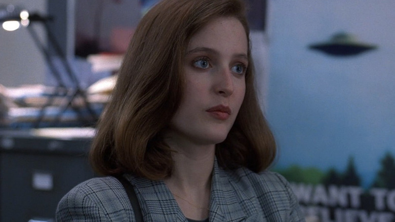 Agent Scully in Mulder's office in the Pilot episode of The X-Files