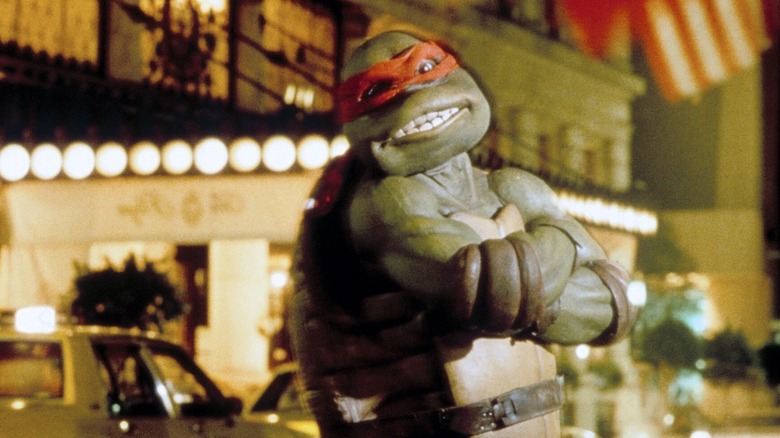 Raphael standing in the street smiling in Teenage Mutant Ninja Turtles (1990)