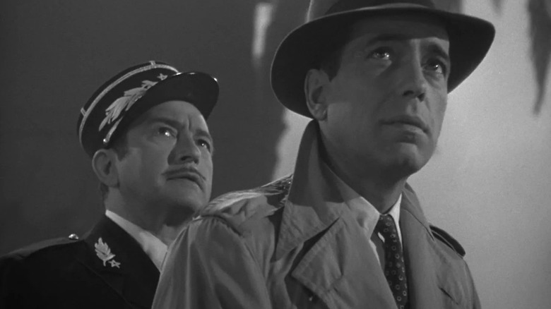 Captain renault and Rick looking at something in the sky at the end of Casablanca