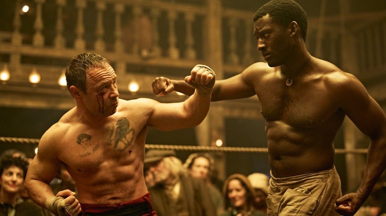 Stephen Graham blocking a punch from Malachi Kirby
