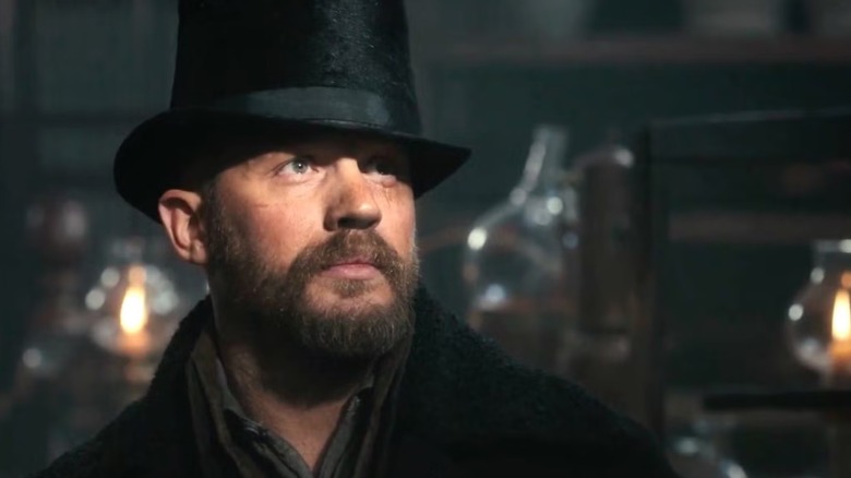 Tom Hardy wearing a tall hat