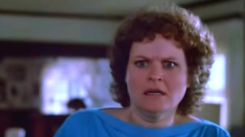 Woman looks terrified