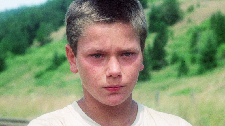 River Phoenix's Chris Chambers is seen in closeup in Stand By Me