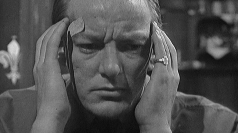 Sir Godfrey Tillinger with a bandage on his head in Undermind