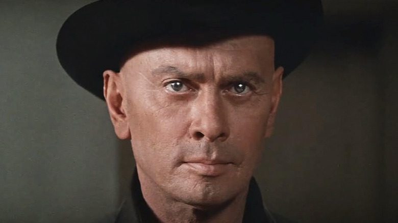 Yul Brynner as the gunslinger wearing a black hat and looking straight at the camera lens in Westworld (1973)