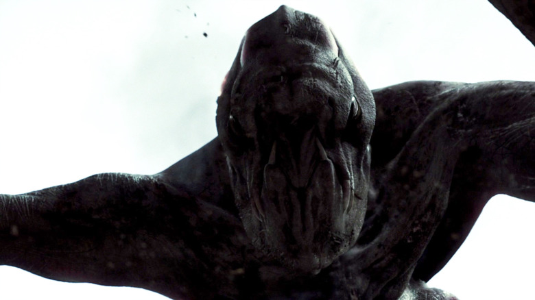 The monster looking down at the camera in Cloverfield