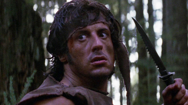 Sylvester Stallone's John Rambo holds a knife in First Blood