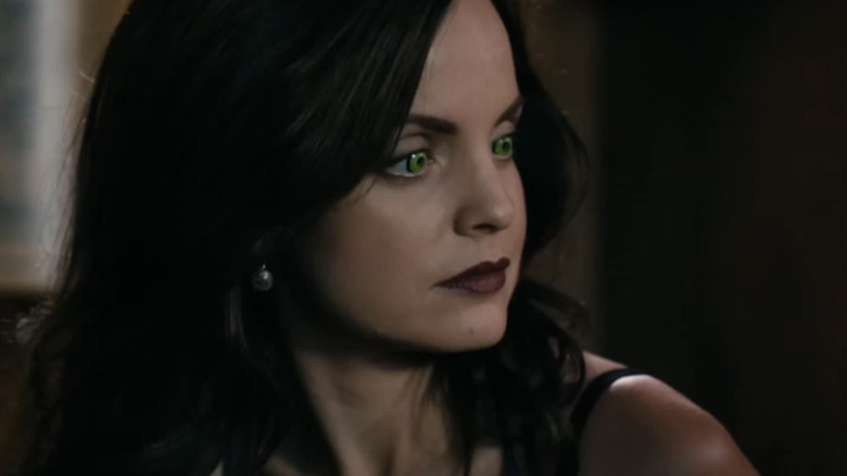 Mena Suvari's Maria Abascal is seen looking off to her left with green eyes in South of Hell
