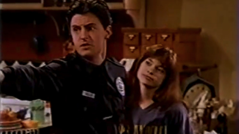 Matthew Perry's Billy Kells points across an apartment as Valerie Bertinelli's Sydney Kells watches in Sydney