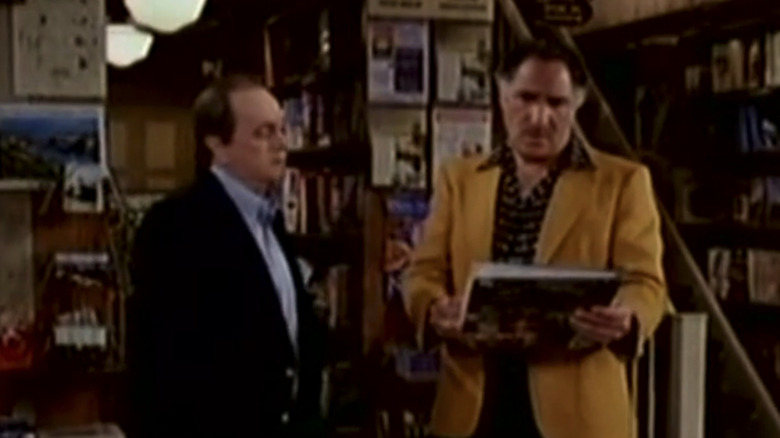 Bob Newhart's George Stoody stands with Judd Hirsch's Leonard "Leo" Wagonman in a book store in George and Leo