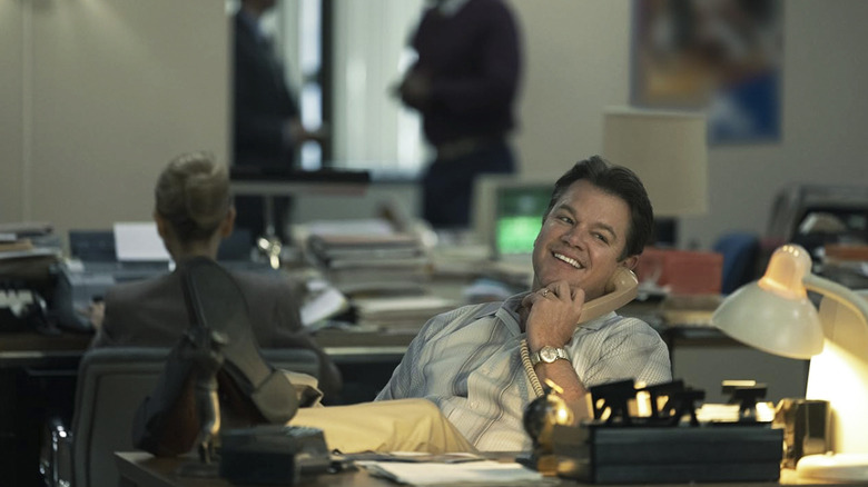 A smiling Sonny Vaccaro is on the phone with his feet kicked up on his desk in Air