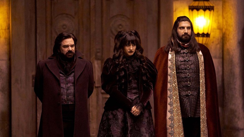 Laszlo, Nadja, and Nandor standing in a line in What We Do in the Shadows