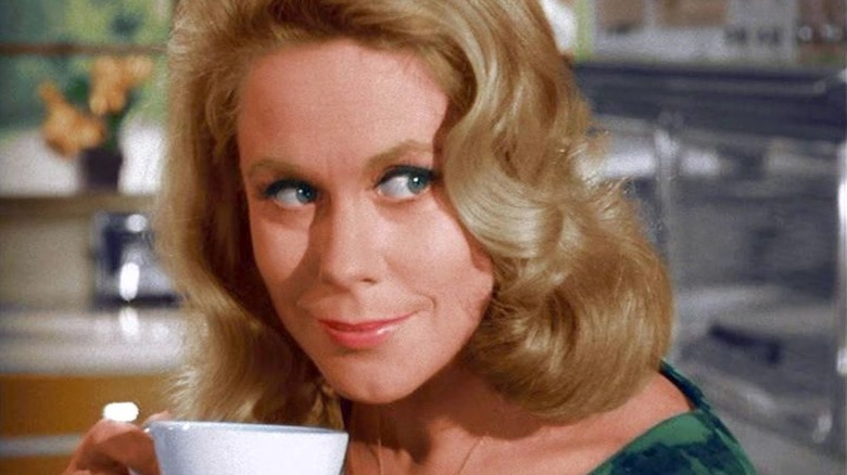 A closeup of Samantha drinking coffee on Bewitched