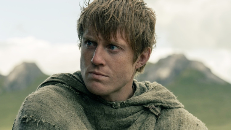 Peter Claffey as Ser Duncan the Tall wearing a cloak in A Knight of the Seven Kingdoms